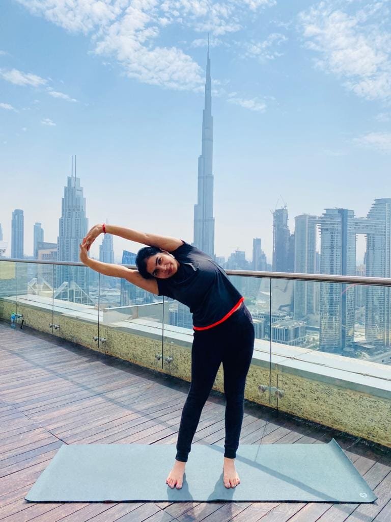 Tiryaka Tadasana - Swaying Palm Tree Pose